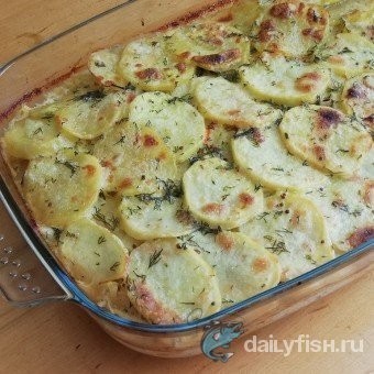 Маринованный минтай, запеченный в картофельно-луковой шубе